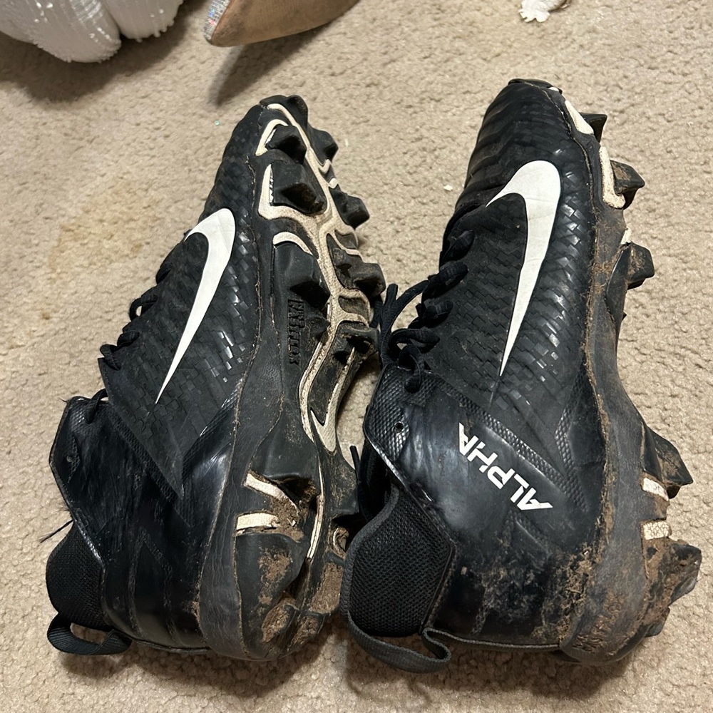 Women’s well worn NIKE cleats